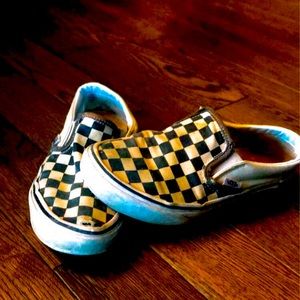 The’s are a pair of used checkered vans.